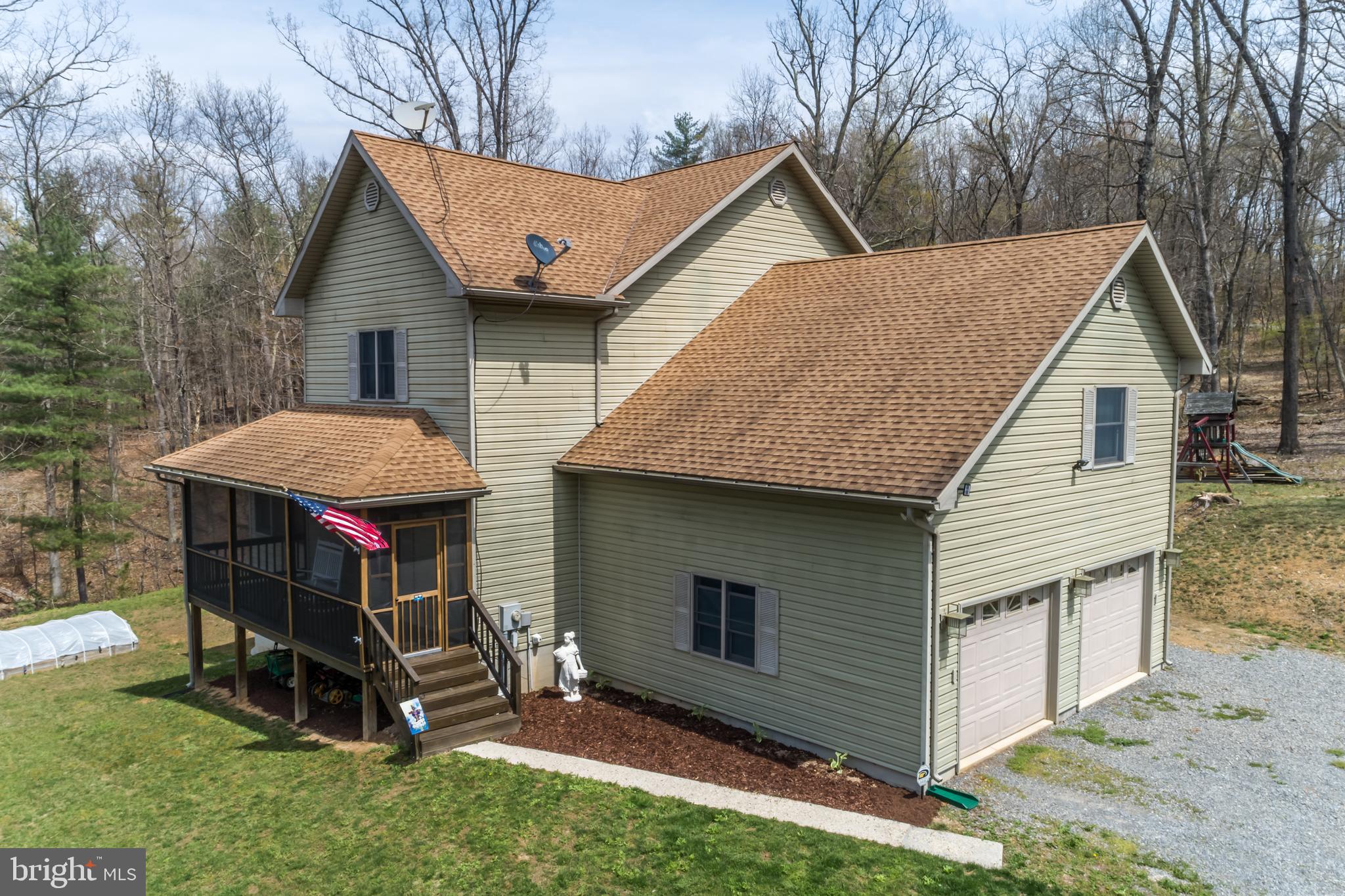 400 Cedar Ridge Road Berkeley Springs, WV 25411 - Photo 1 of 40 3 BR 2 1/2 bath contemporary home on 3+ acres
