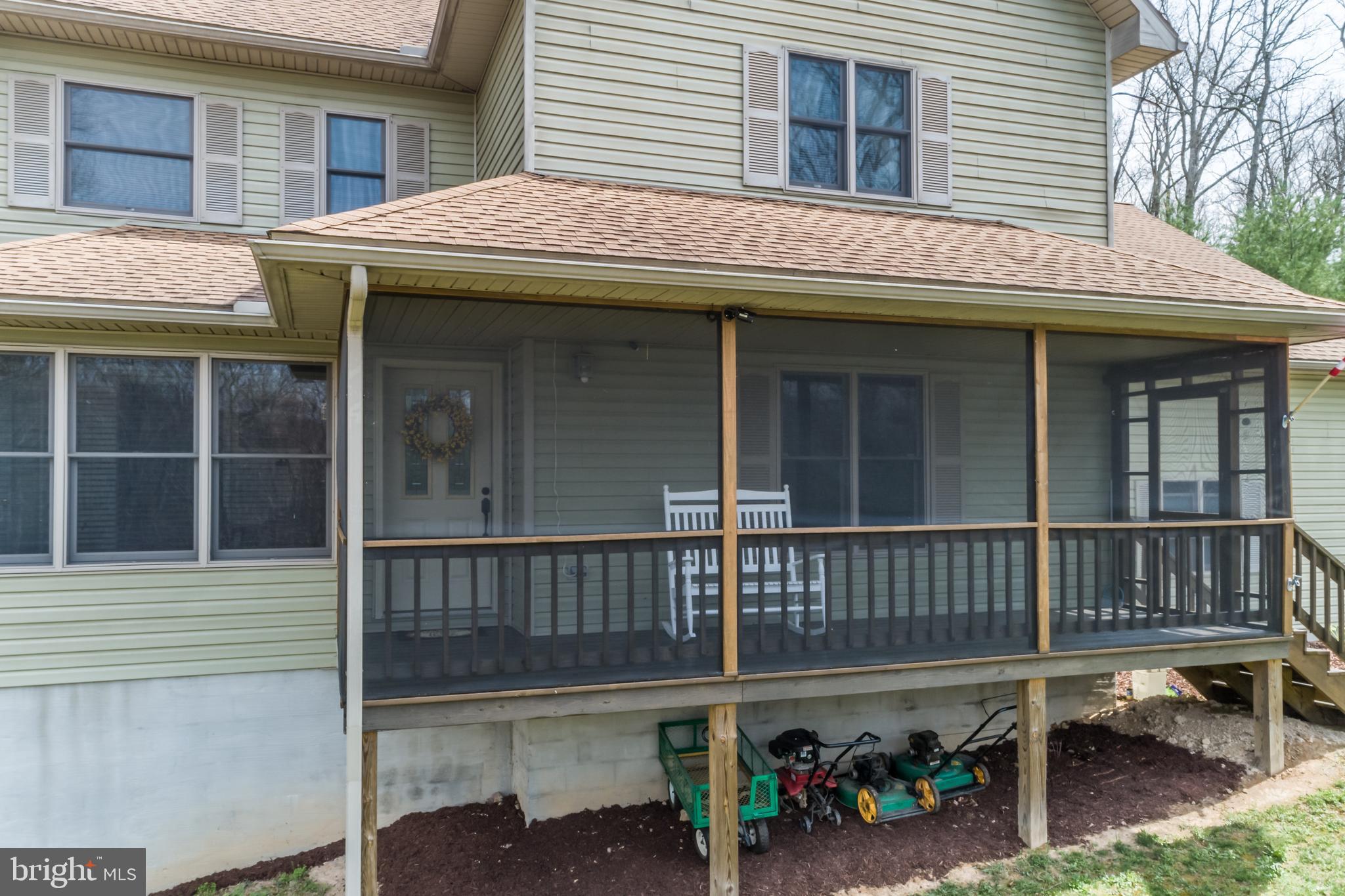 400 Cedar Ridge Road Berkeley Springs, WV 25411 - Photo 4 of 40 screened front porch