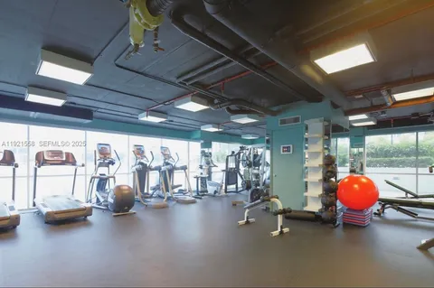 a view of a room with gym equipment