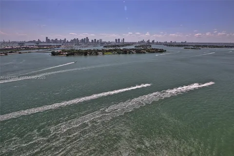 a view of a lake with a city