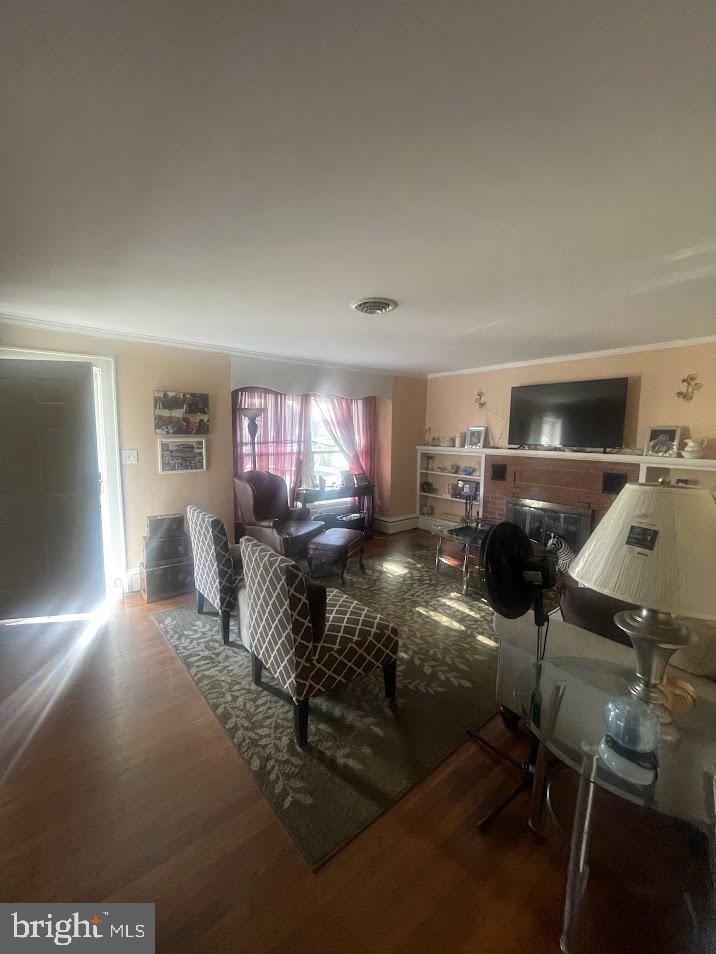 202 Gumboro Road Selbyville, DE 19975 - Photo 13 of 22 a living room with furniture and a gym equipment
