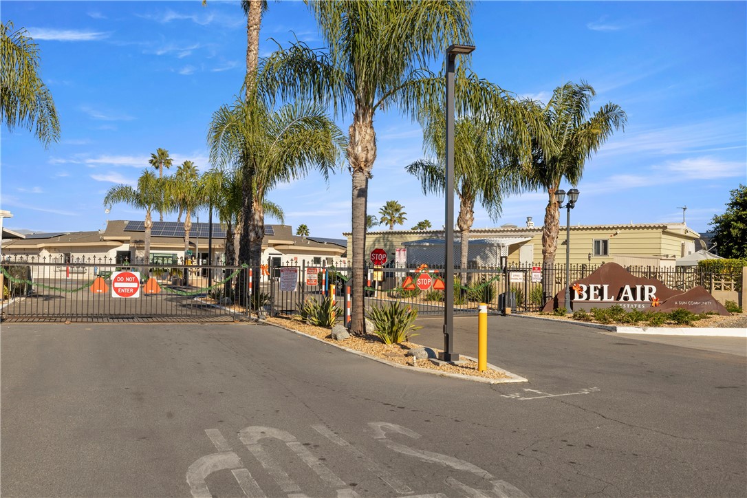 27150 Shadel Road, Unit 122 Menifee, CA 92586 - Photo 17 of 26 a view of a street with a cars park
