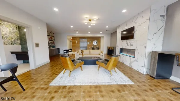 a lobby with a couch and a rug
