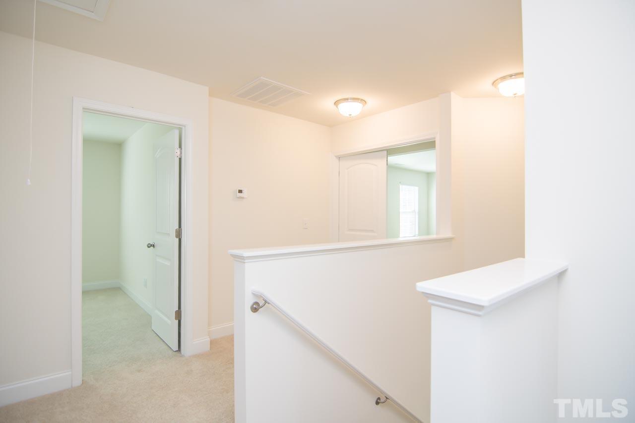 4531 Lord Mario Court Raleigh, NC 27610 - Photo 18 of 27 a view of a hallway with entryway