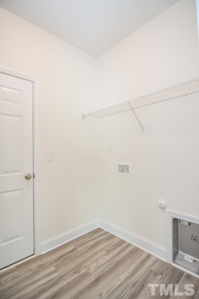 4531 Lord Mario Court Raleigh, NC 27610 - Photo 24 of 27 a view of a small space with wooden floor