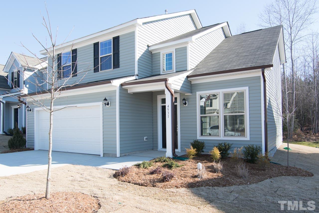 4531 Lord Mario Court Raleigh, NC 27610 - Photo 5 of 27 a view of a house with a snow on the road