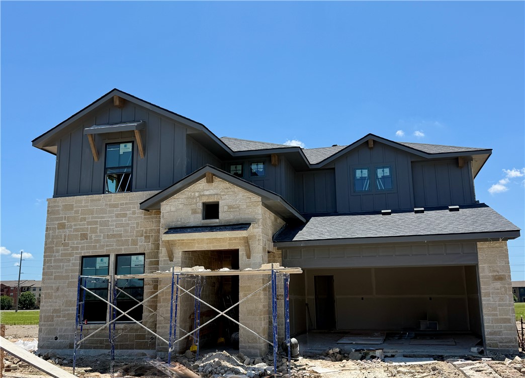 5010 Acadia Loop Bryan, TX 77802 - Photo 2 of 21 a front view of a house with parking space