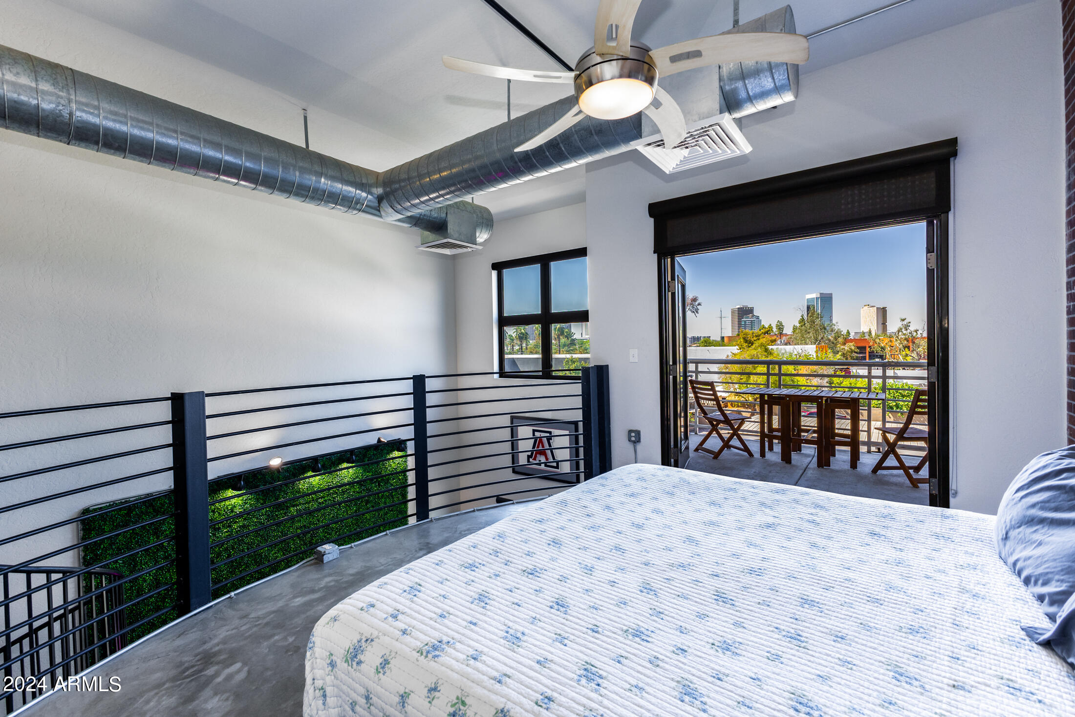 914 East Osborn Road, Unit 212 Phoenix, AZ 85014 - Photo 4 of 32 Loft Bedroom w/ City Views