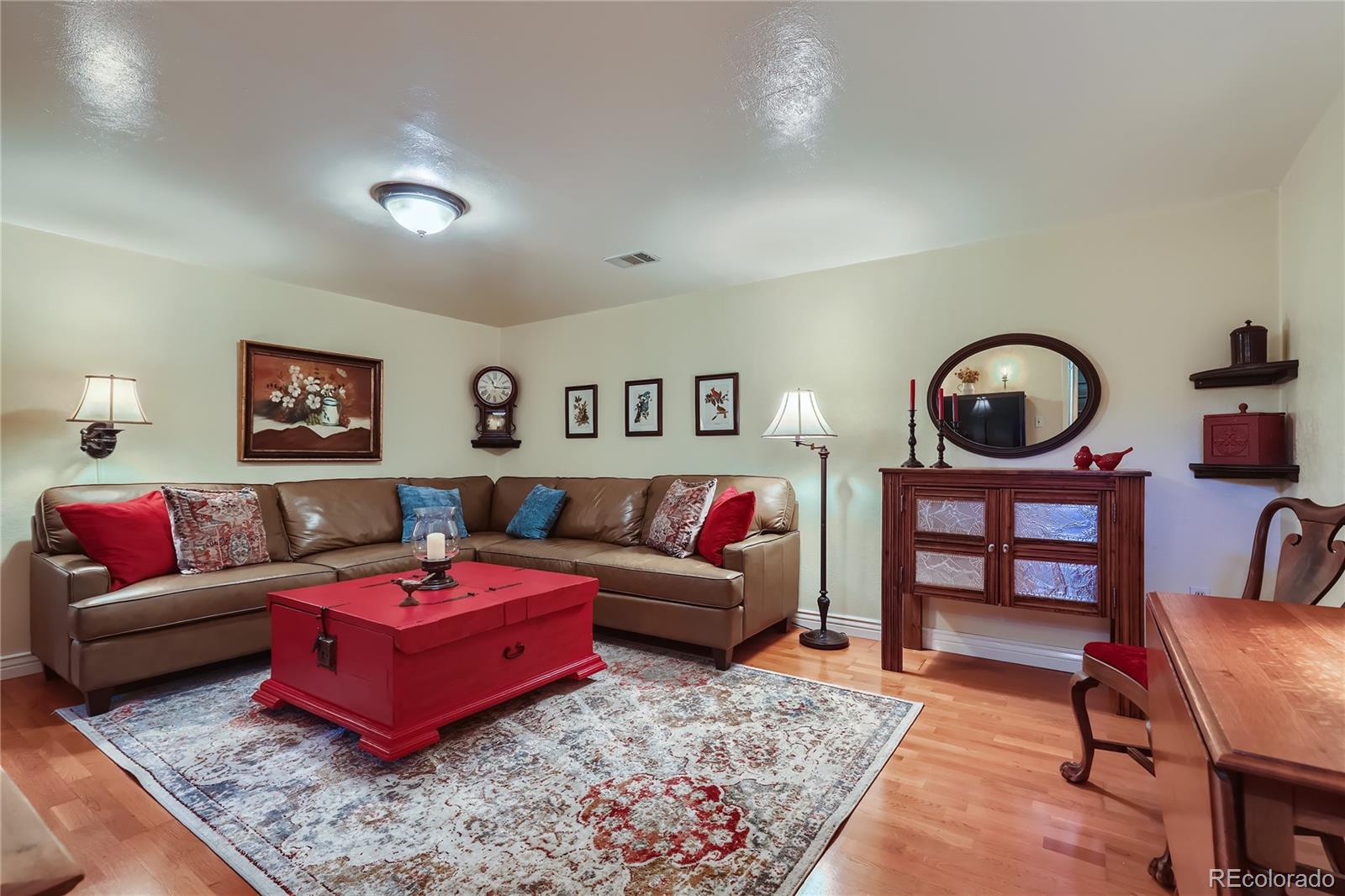 5366 Field Circle Arvada, CO 80002 - Photo 23 of 28 a living room with furniture and a rug
