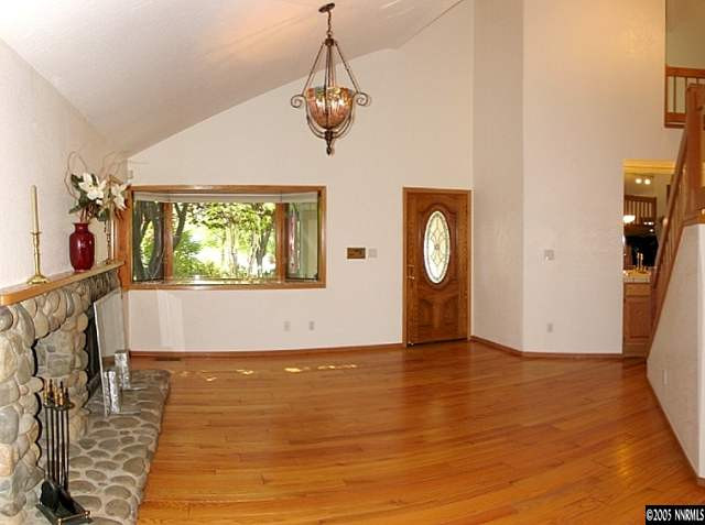4075 Riverhaven Drive Reno, NV 89519 - Photo 2 of 9 a view of an entryway with wooden floor