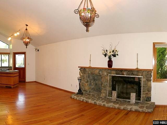 4075 Riverhaven Drive Reno, NV 89519 - Photo 3 of 9 a living room with fireplace furniture and a fireplace