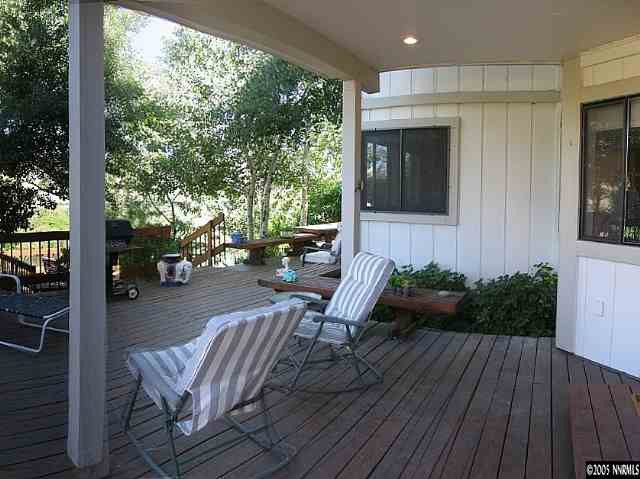 4075 Riverhaven Drive Reno, NV 89519 - Photo 9 of 9 a view of a patio with couches table and chairs and potted plants