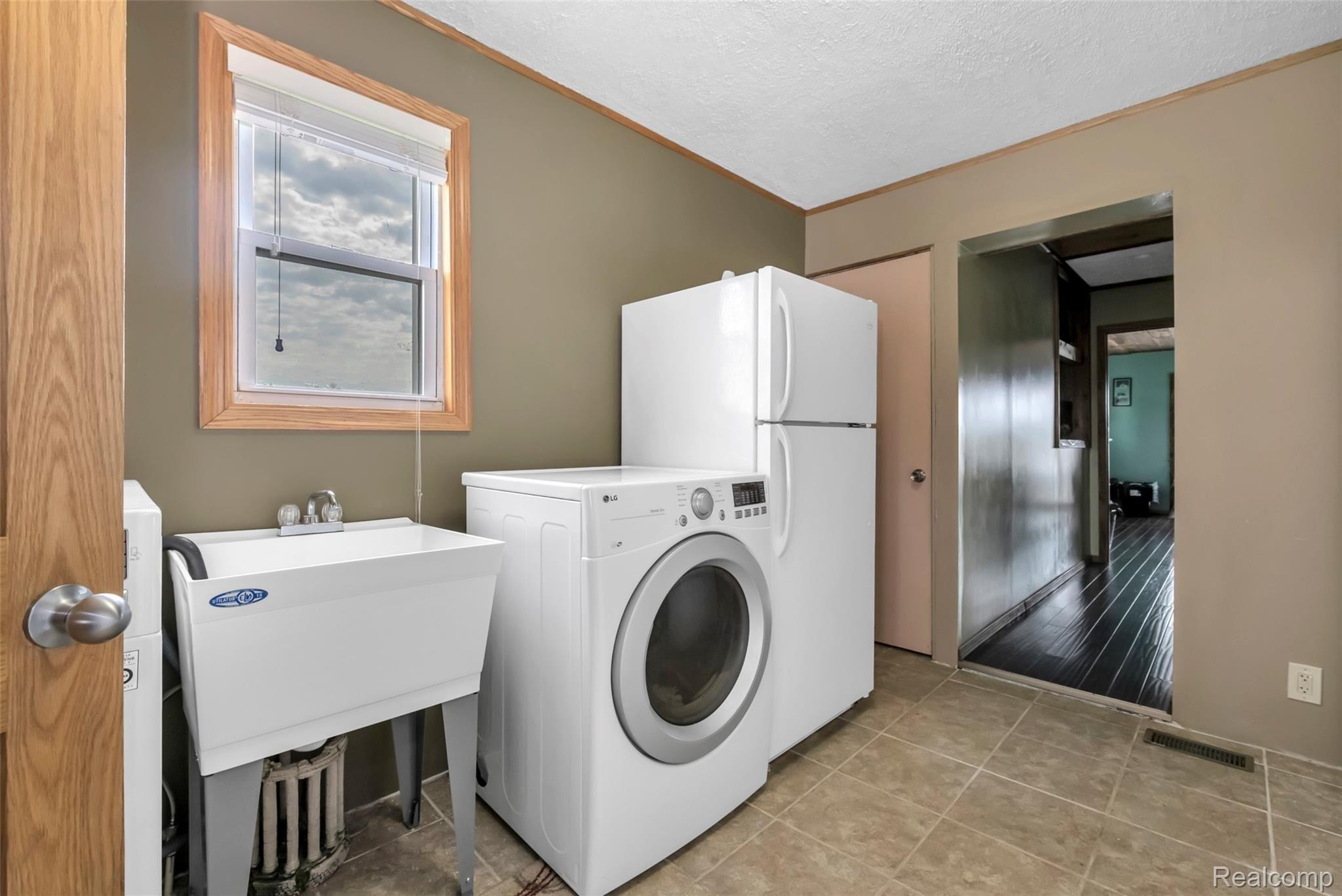 2185 Peet Road New Lothrop, MI 48460 - Photo 17 of 29 Laundry Room off Master Bedroom