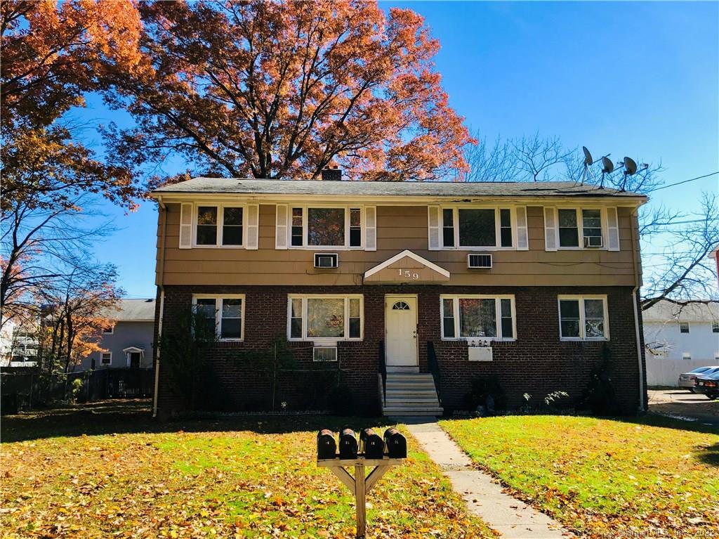 159 Dogburn Road West Haven, CT 06516 - Photo 1 of 1 a front view of a house with a yard
