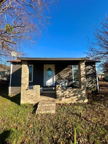 a view of a house with a patio
