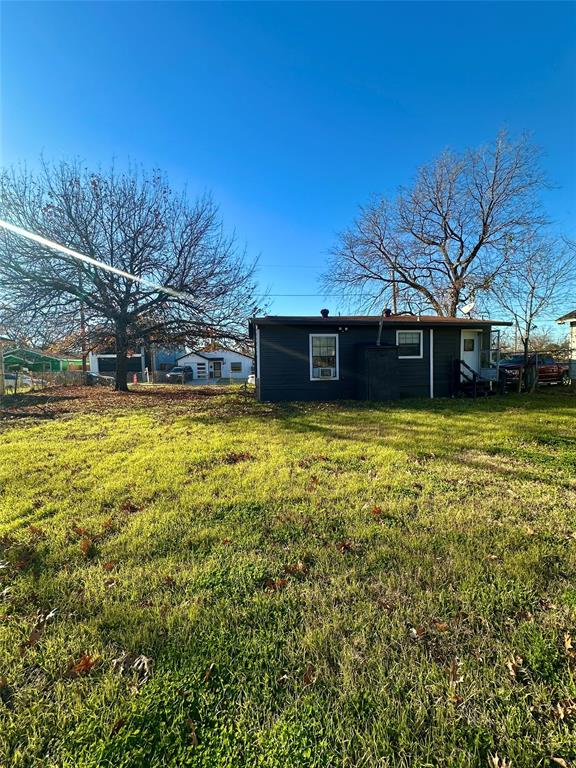 3350 Parvia Avenue Dallas, TX 75212 - Photo 7 of 7 a view of a swimming pool with an outdoor space and seating area