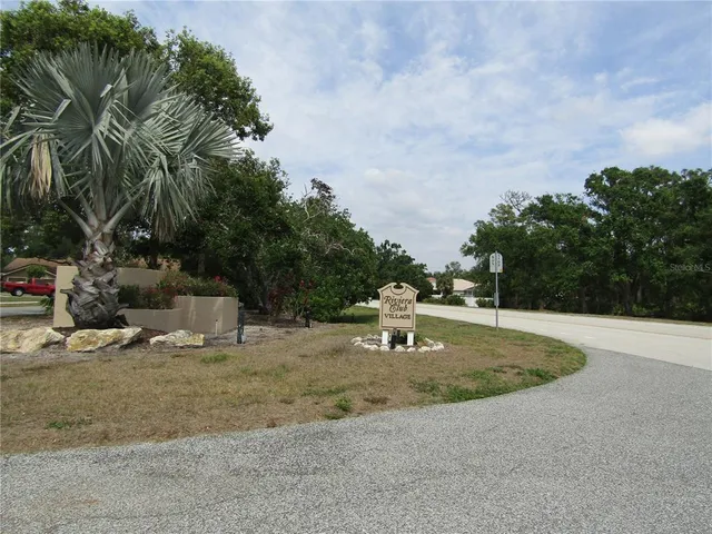 a backyard of a house with yard and entertaining space