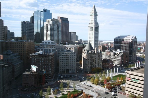 10 Rowes Wharf, Unit PH4 Boston, MA 02110 - Photo 28 of 41 a city view with tall buildings