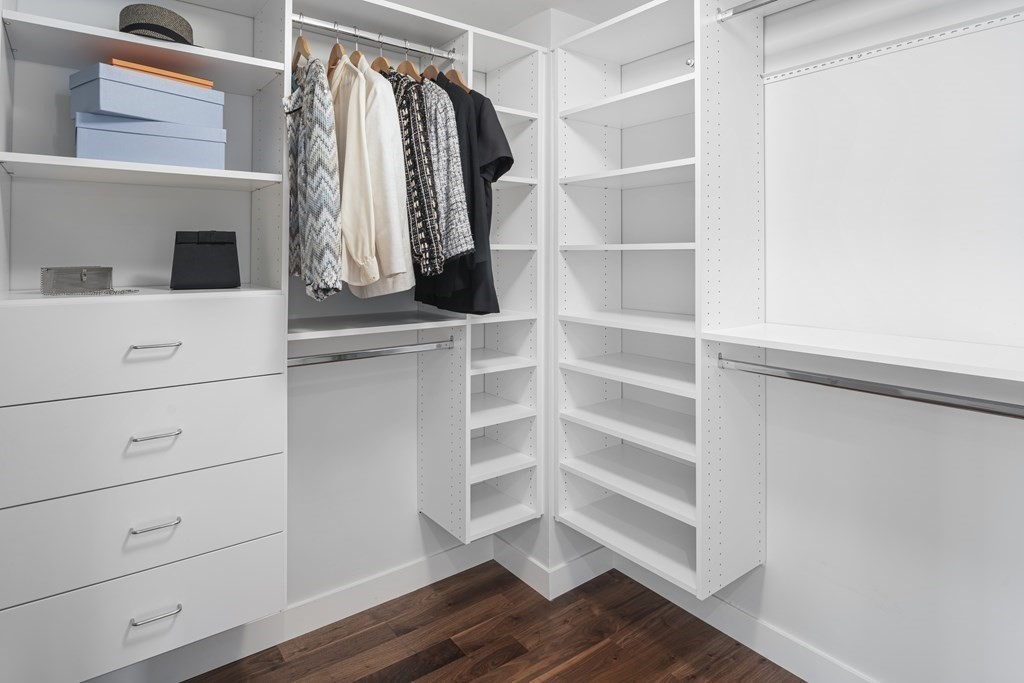 10 Rowes Wharf, Unit PH4 Boston, MA 02110 - Photo 30 of 41 a view of walk in closet with empty racks