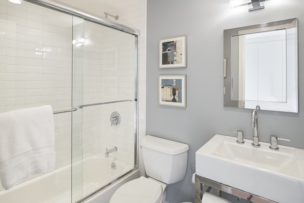 10 Rowes Wharf, Unit PH4 Boston, MA 02110 - Photo 36 of 41 a bathroom with a sink toilet and shower