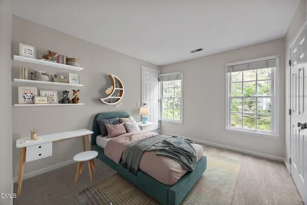 a bathroom with a shower and a window