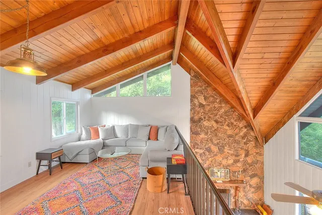 a balcony view with a seating space