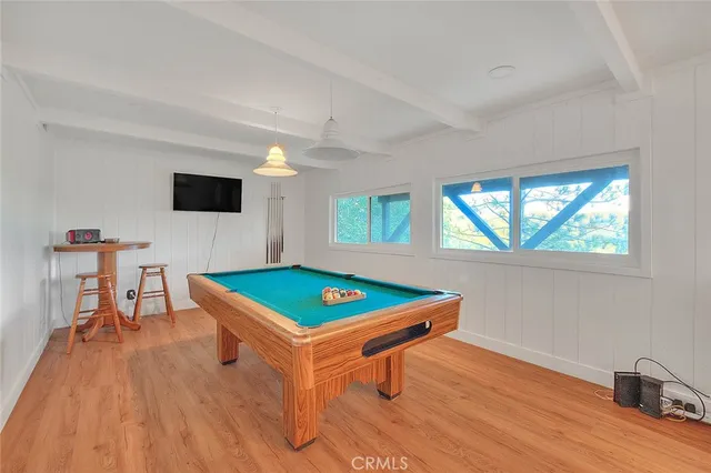 a room with furniture and a wooden floor