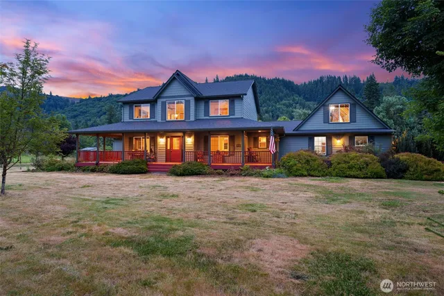 a front view of a house with yard