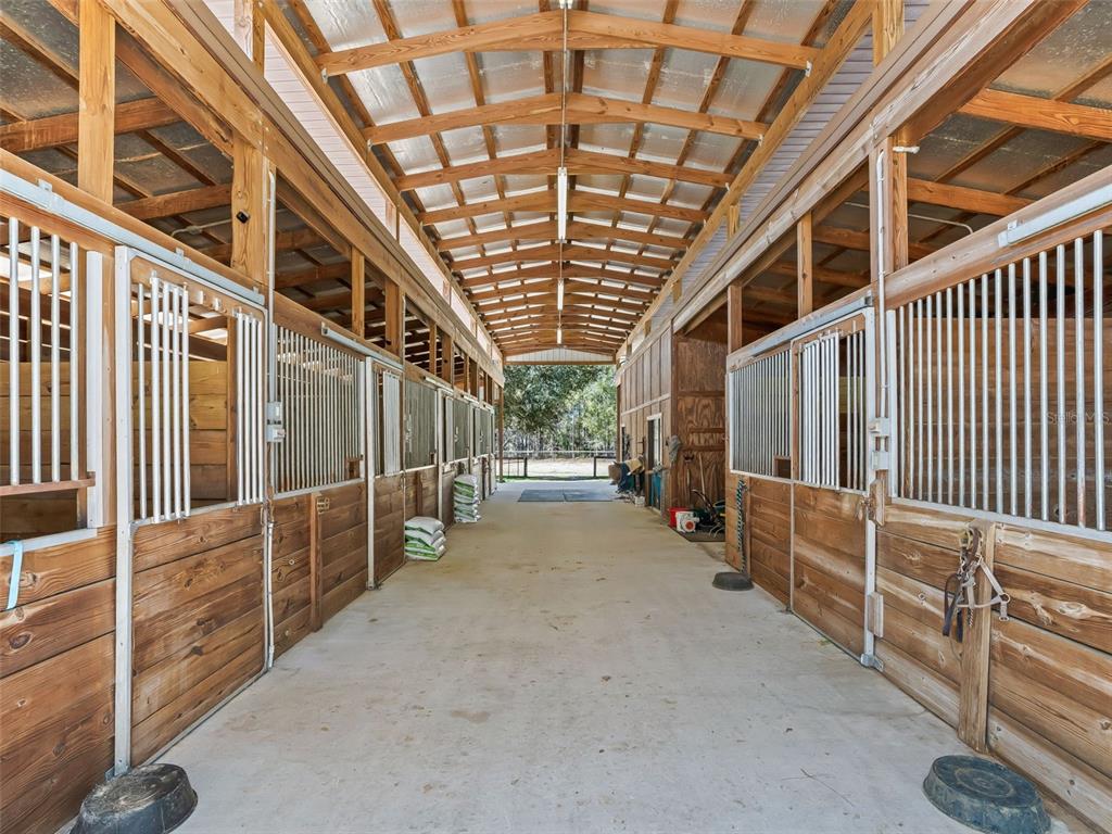 11670 Southeast 6th Street Williston, FL 32696 - Photo 47 of 63 a view of an empty room with wooden walls