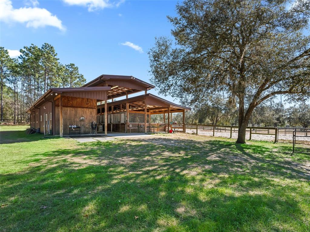 11670 Southeast 6th Street Williston, FL 32696 - Photo 55 of 63 a view of a house with a yard