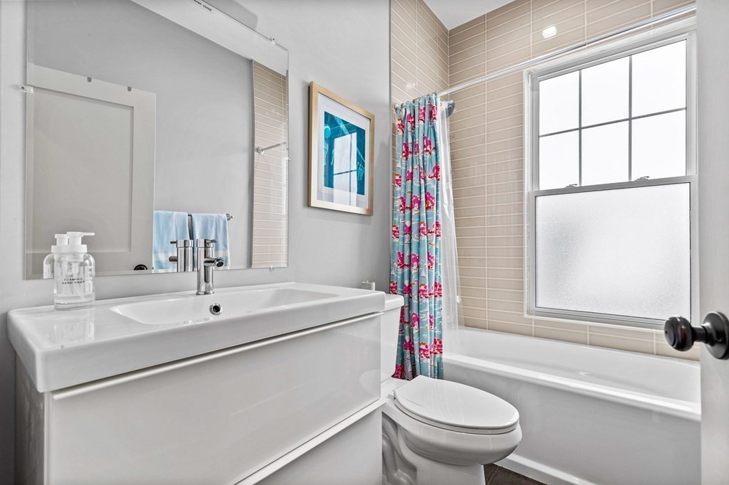 241 Lexington Street, Unit 2 Boston, MA 02128 - Photo 14 of 21 a bathroom with a sink toilet and shower