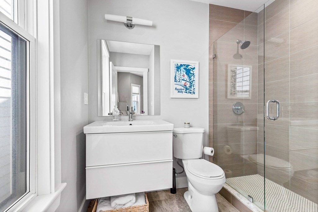 241 Lexington Street, Unit 2 Boston, MA 02128 - Photo 18 of 21 a bathroom with a sink toilet and shower