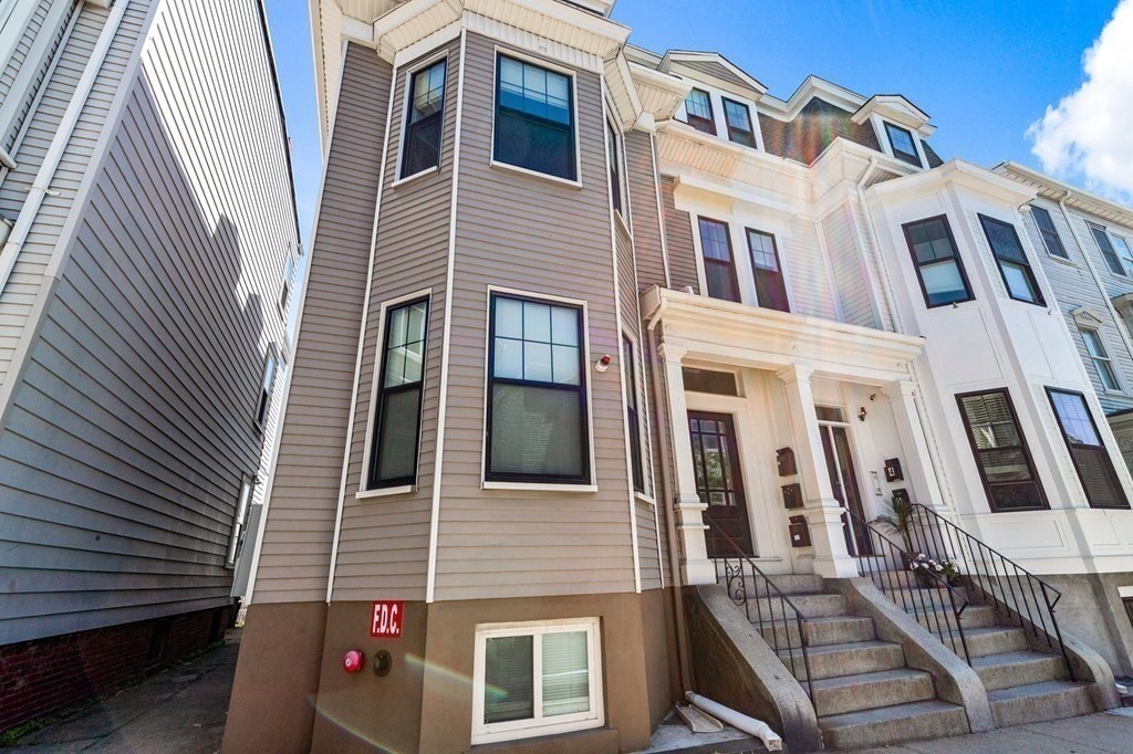 241 Lexington Street, Unit 2 Boston, MA 02128 - Photo 20 of 21 a front view of a multi story residential apartment building