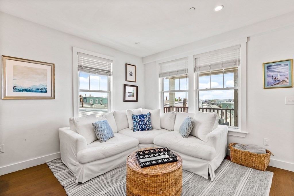 241 Lexington Street, Unit 2 Boston, MA 02128 - Photo 6 of 21 a living room with furniture and a large window
