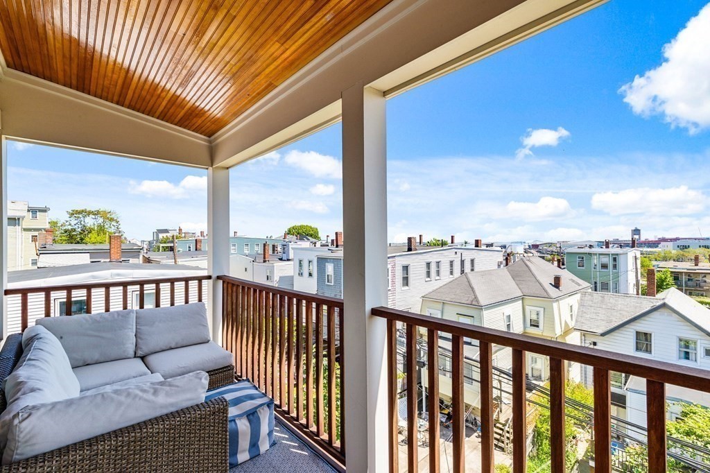 241 Lexington Street, Unit 2 Boston, MA 02128 - Photo 8 of 21 a view of a balcony with furniture