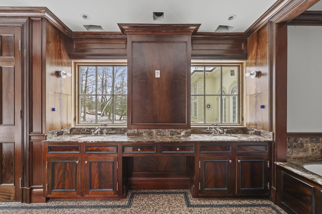 209 Blue Hill Road Great Barrington, MA 01230 - Photo 25 of 42 a bathroom with a sink and a mirror