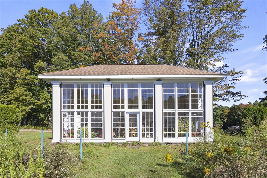 209 Blue Hill Road Great Barrington, MA 01230 - Photo 32 of 42 front view of a house with a yard