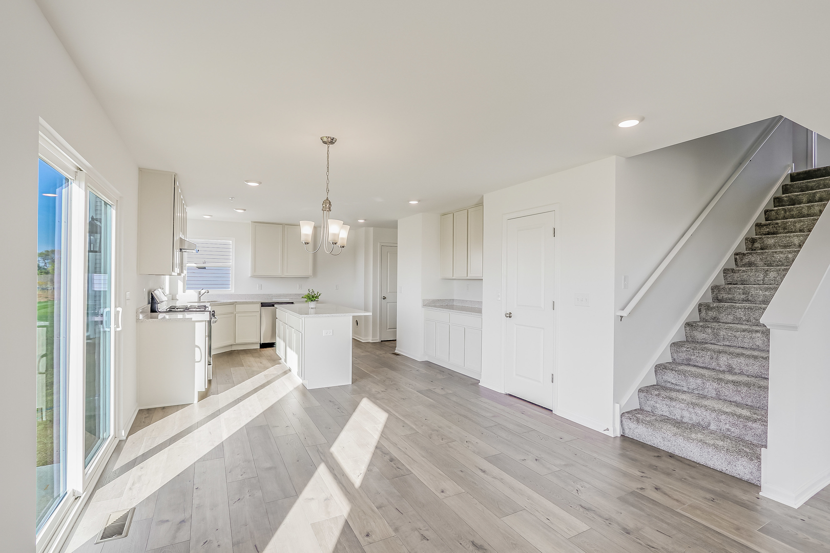 512 Endicott Road South Elgin, IL 60177 - Photo 12 of 30 a view of a kitchen with wooden floor and windows