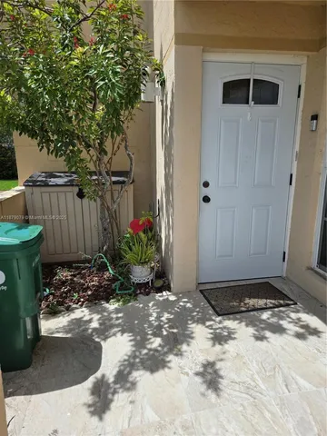a view of a backyard of the house