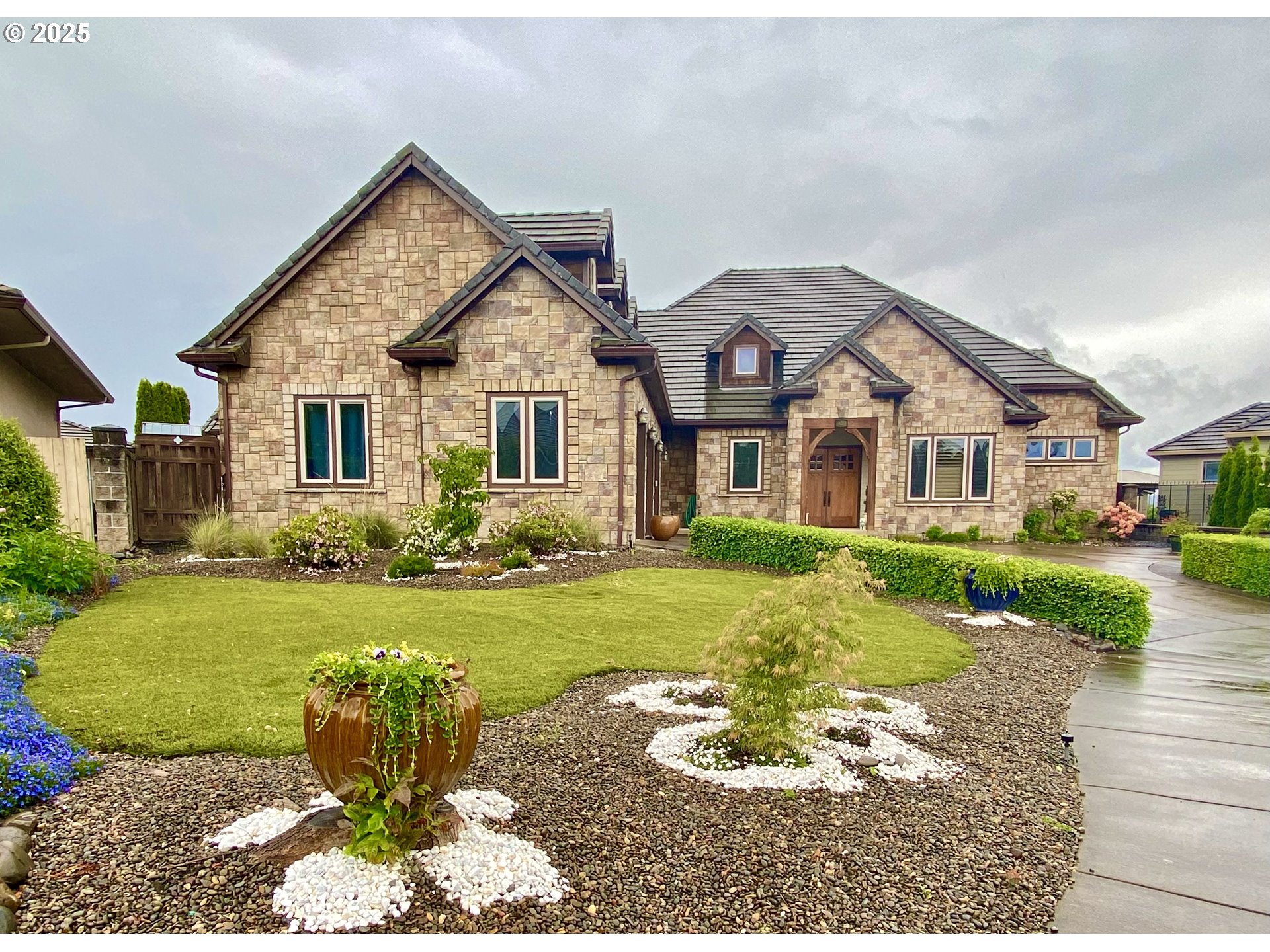 a front view of a house with a yard