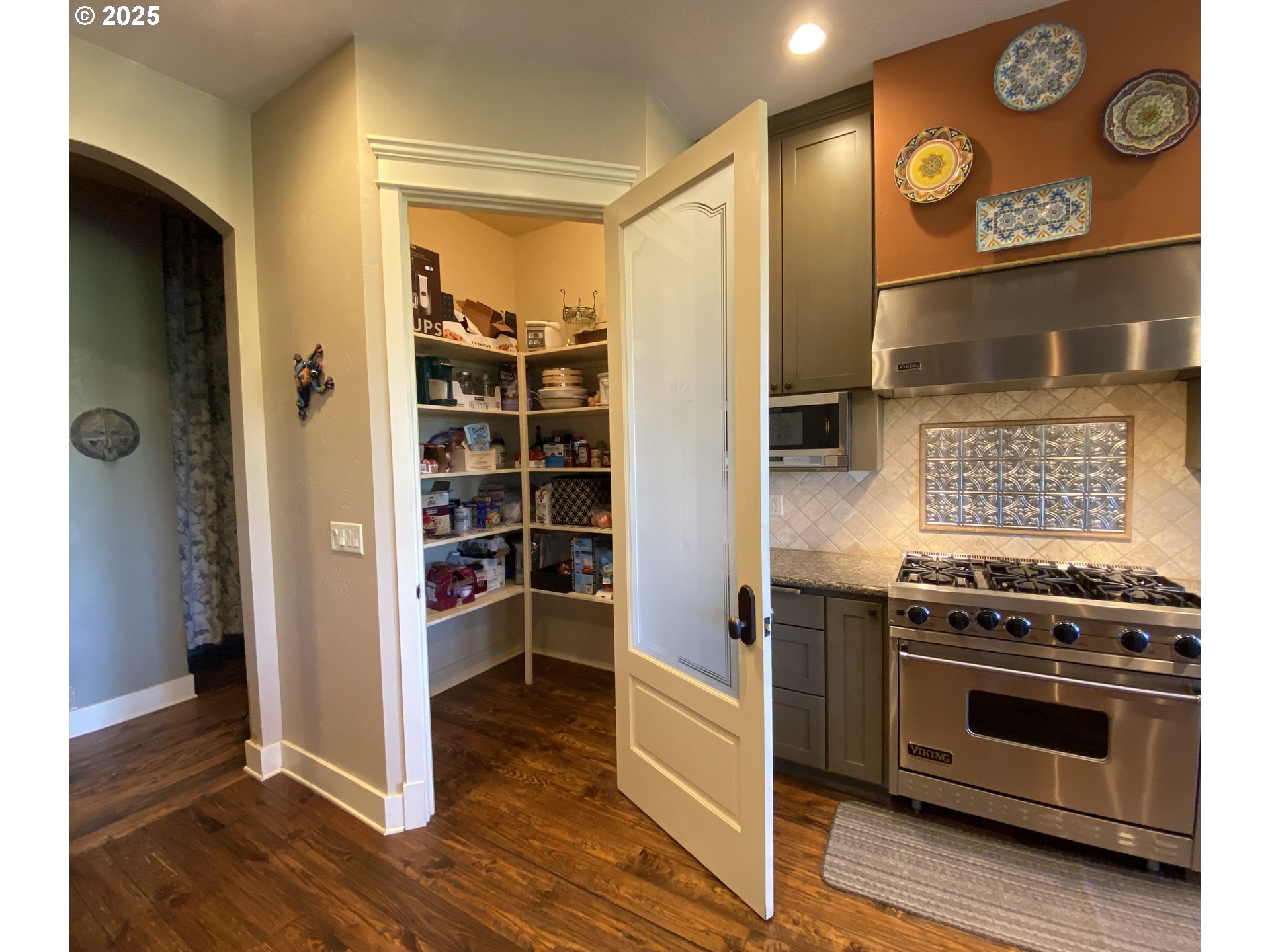 625 St Andrews Loop Creswell, OR 97426 - Photo 13 of 31 a kitchen with stainless steel appliances granite countertop a stove and a refrigerator