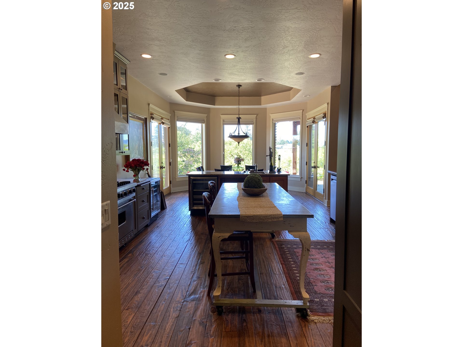 625 St Andrews Loop Creswell, OR 97426 - Photo 6 of 31 a view of a dining room with furniture and wooden floor