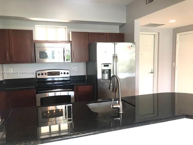 7275 Southwest 89th Street, Unit B415 Miami, FL 33156 - Photo 7 of 30