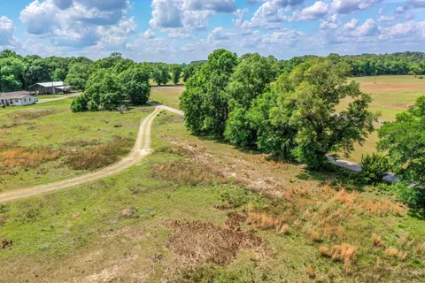 a view of a lake with a park