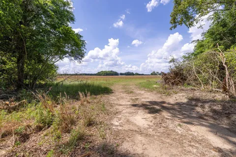 a view of a lake and sunset