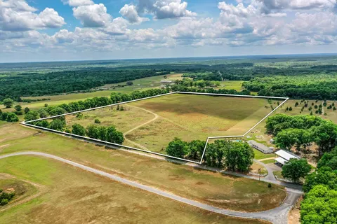 a view of swimming pool with a garden