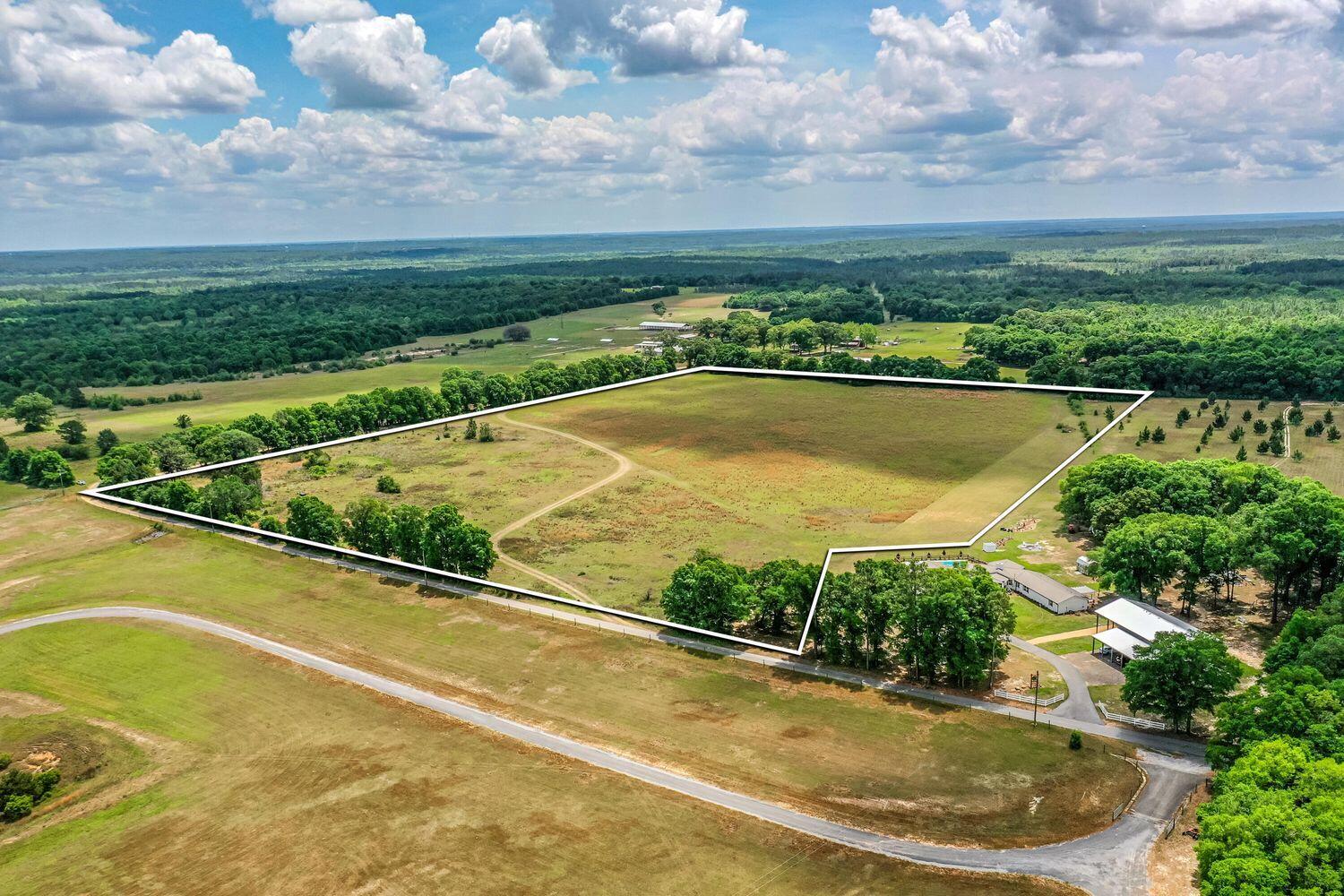 1704 Cobb Road Baker, FL 32531 - Photo 3 of 29 a view of swimming pool with a garden