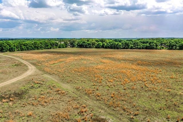 a view of a lake with a building