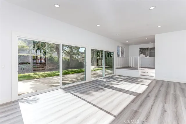 a view of a living room and front door