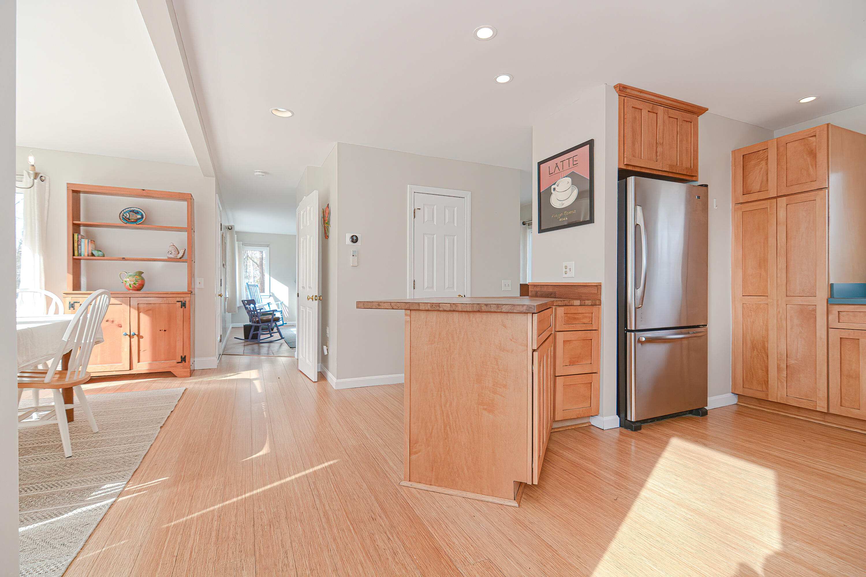 155 Gross Hill Road Wellfleet, MA 02667 - Photo 17 of 52 a kitchen with stainless steel appliances a refrigerator and a stove
